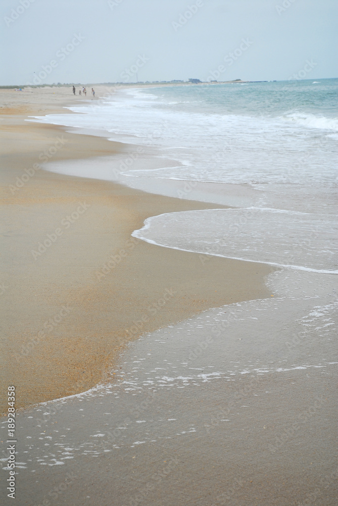 Tide wave in the beach in summer season Tide wave in the beach in summer season