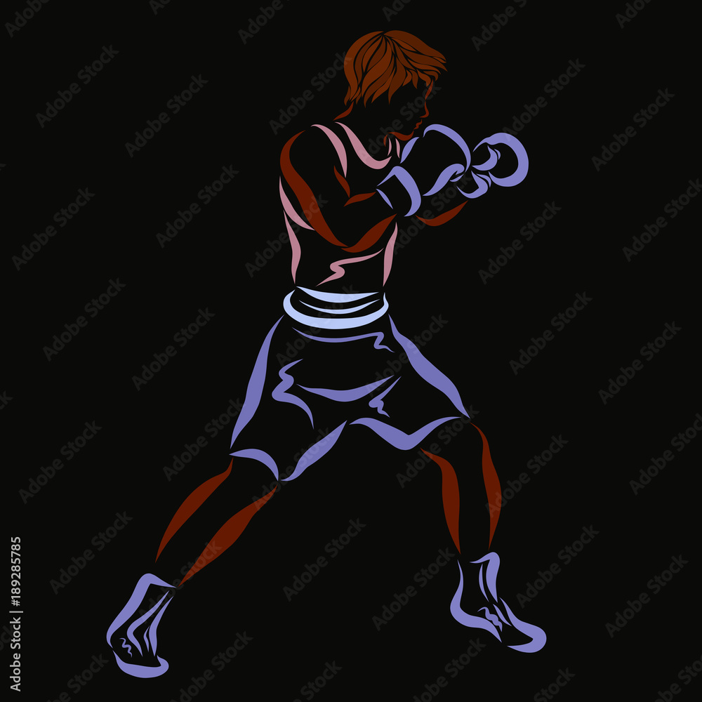 Young strong boxer on a black background