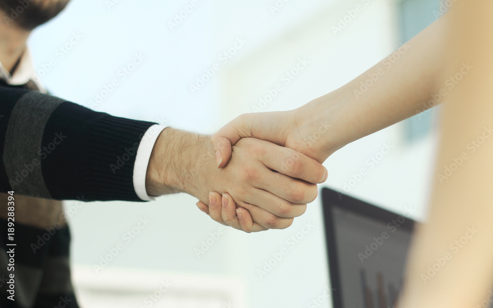 image of a firm handshake image of a firm handshake