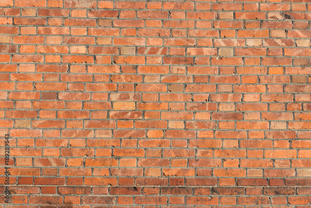 Fototapeta premium Background of the old red brick wall