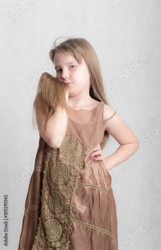 young model in brown dress