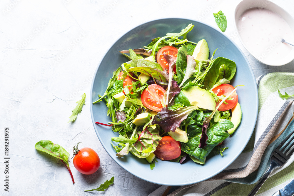 Fresh green salad. Healthy diet food. Fresh green salad. Healthy diet food.