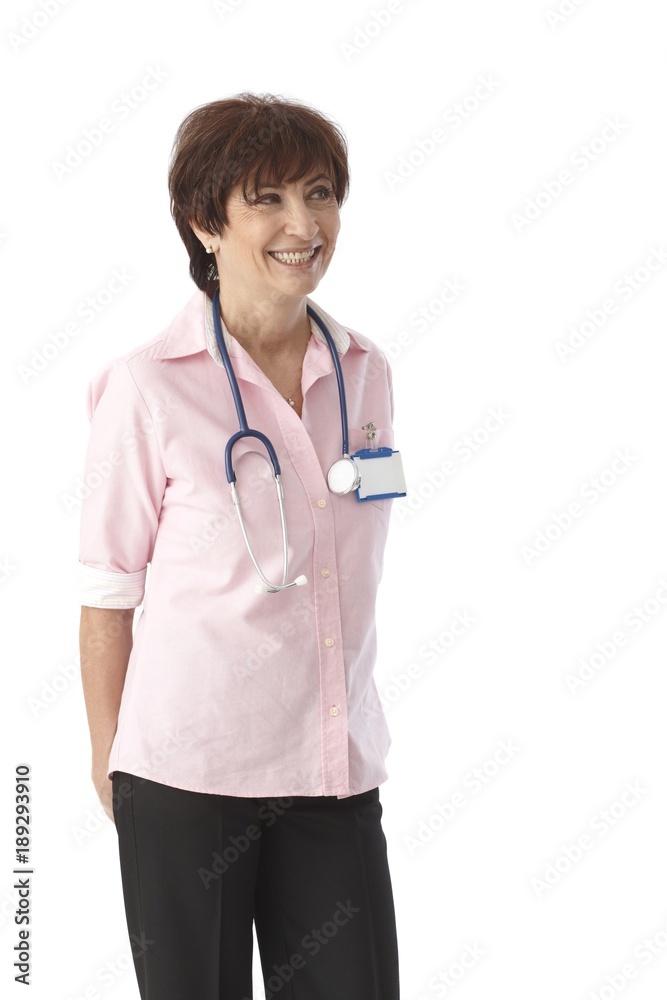Happy female doctor smiling with hands behind Happy female doctor smiling with hands behind
