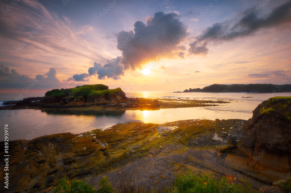 Batu Payung, Lombok coast, Indonesia view sunset travel tour.