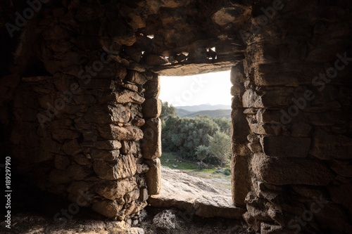 View through door of Troglodyte house at Ostriconi in Corsica