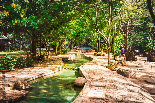 Foot bath with hot spring water nature scene