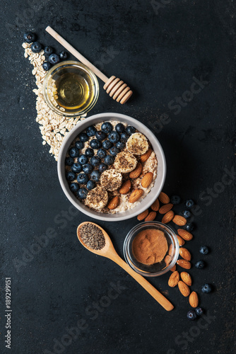 Oatmeal with blueberries, bananas and chia seed © Tijana