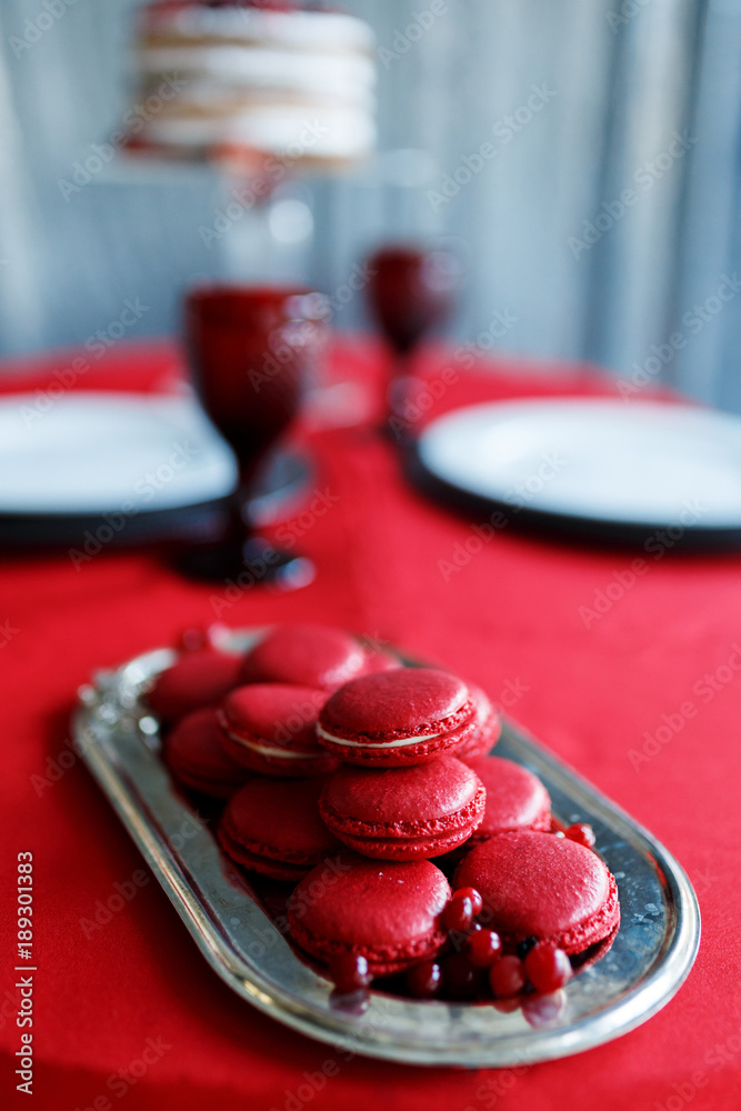 Red berry macaroons in a beautiful tray Red berry macaroons in a beautiful tray