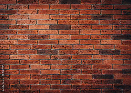 Red brick wall texture grunge background may use to interior design