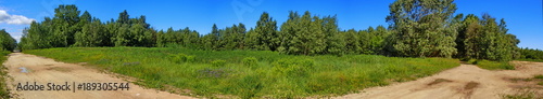 Panoramic view of unpaved road 