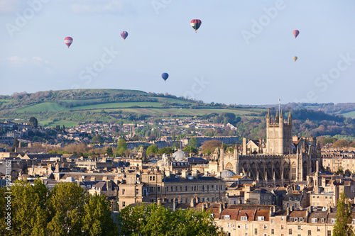 Hot air balloons flying over the city of Bath in England, UK.