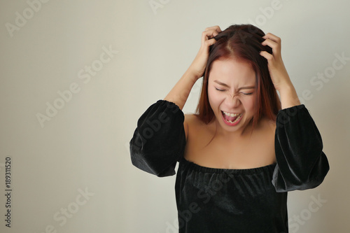 stressed upset woman screaming or shouting out loudly