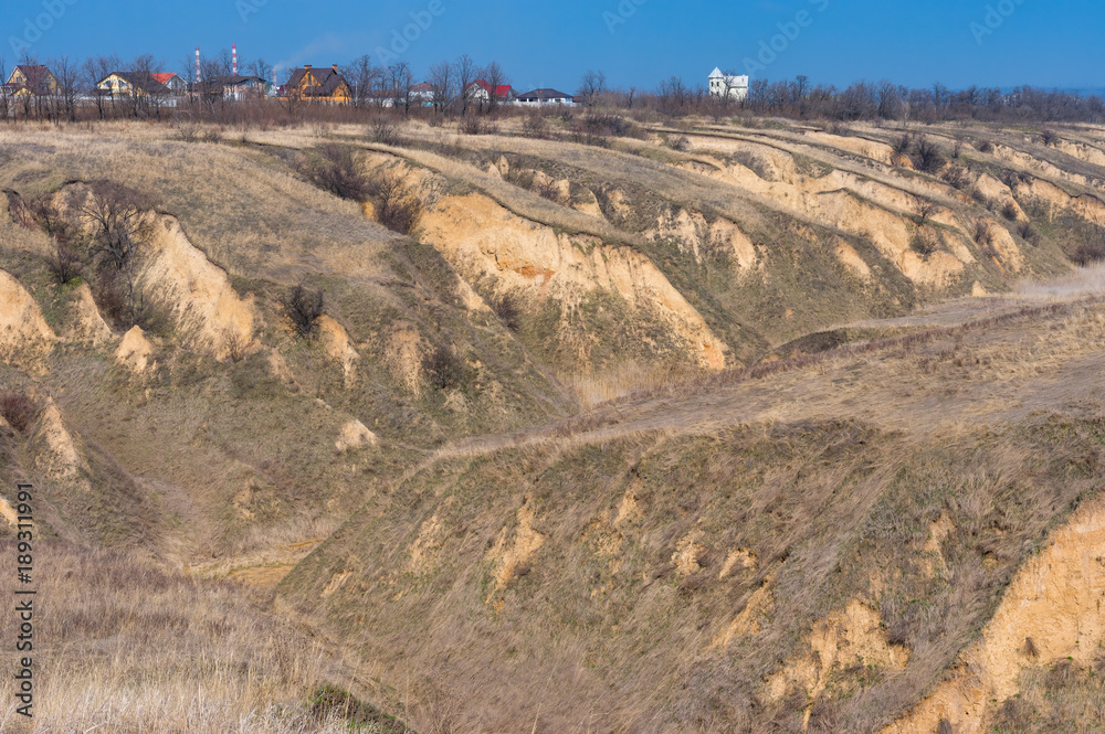 Spring landscape with soil erosion in outskirts of Dnepr city, Ukraine