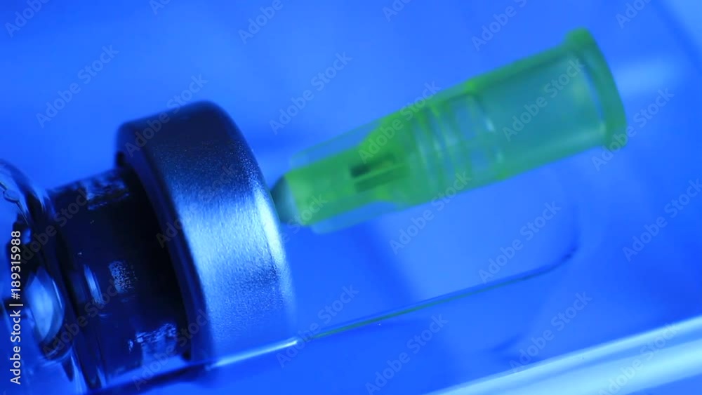 Macro of a syringe in the laborathory. Macro of a syringe in the laborathory.