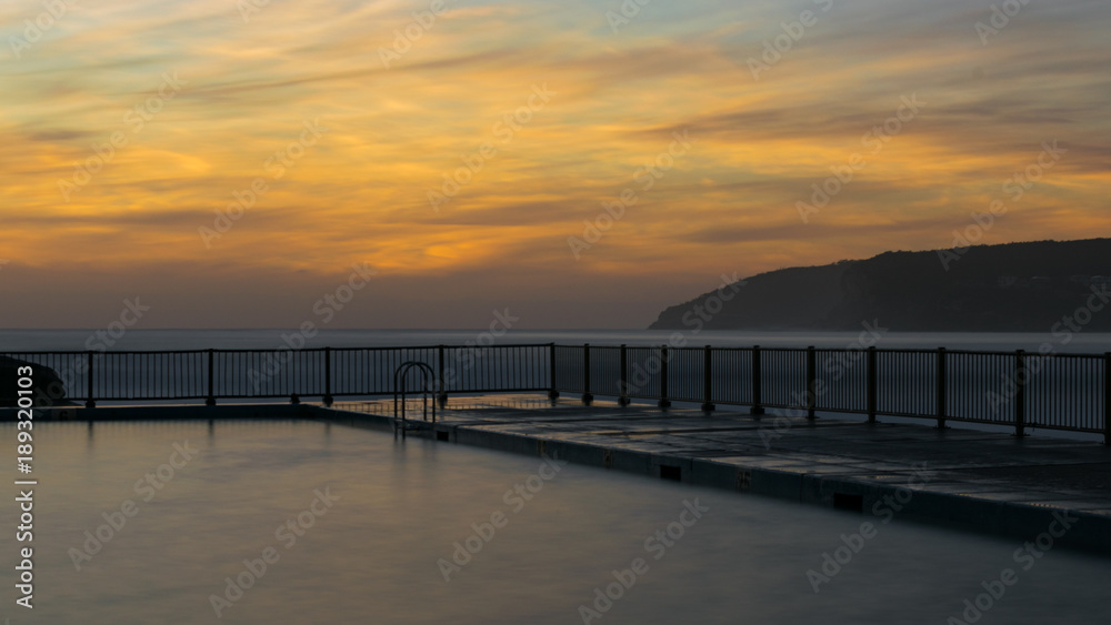 Long exposure of Queenscliff Rock Pool at Manly Beach shortly after sunrise - Sydney, Australia