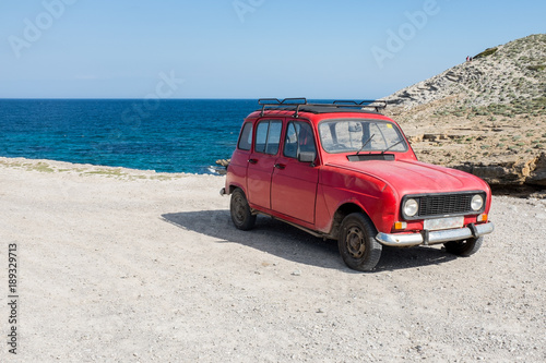 old vintage car on the beach © OceanProd