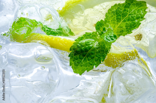 Lemon drop in fizzy sparkling water, juice refreshment