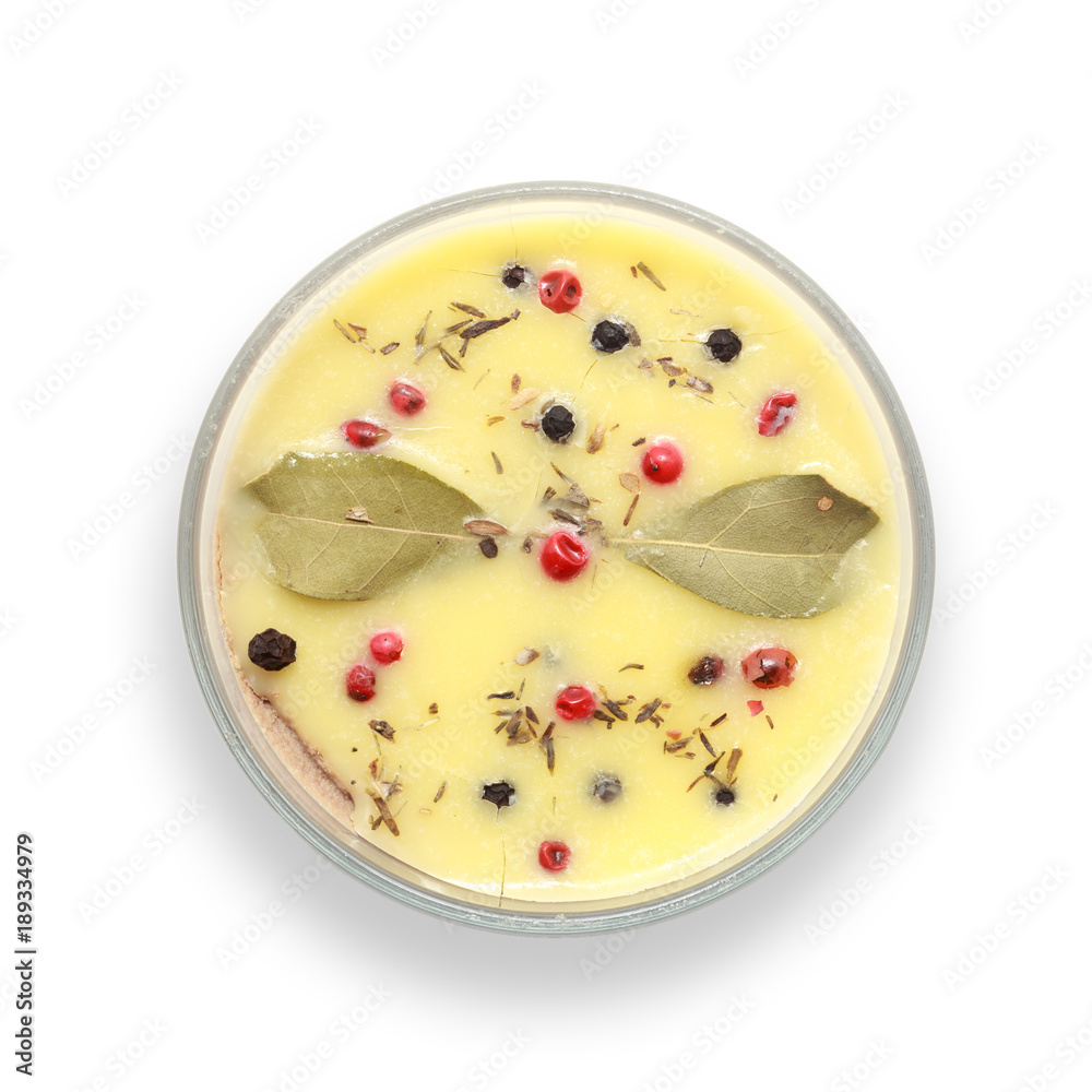 Chicken liver pate covered with melted butter and decorated with bay leaves and black and red pepper isolated on white background. Top view. Chicken liver pate covered with melted butter and decorated with bay leaves and black and red pepper isolated on white background. Top view.