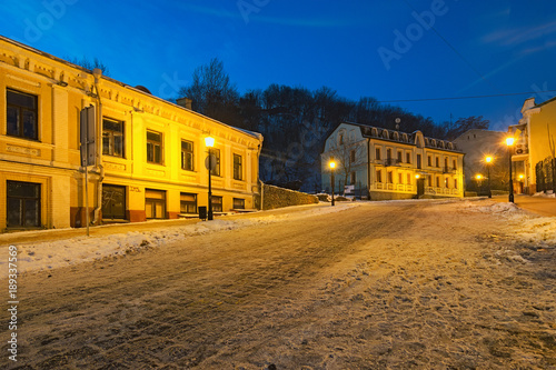 KYIV  UKRAINE-JANUARY 21  2018  An early morning view of colourful buildings on empty Andriyivskyy Uzvoz  Descent or Spusk . One of the oldest street in Kyiv