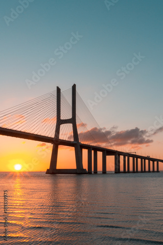 Vasco da Gama Bridge at sunrise, Lisbon, Portugal © ronnybas