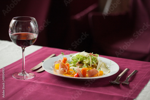 A glass of wine with a meal in the restaurant