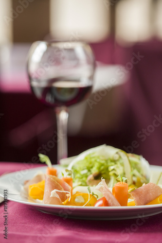 A glass of wine with a meal in the restaurant