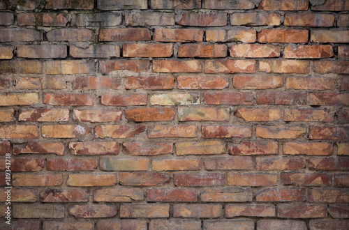 old weathered dirty brick wall