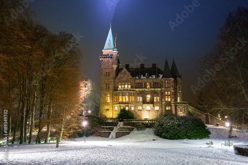 Teleborg Castle at snowy night in Vaxjo, Sweden photo