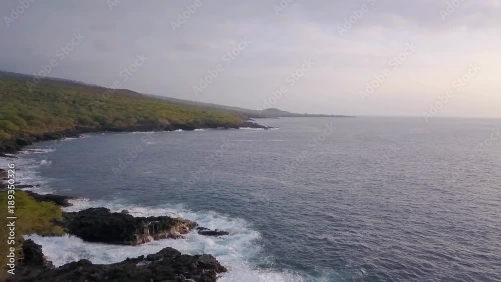 Aerial pullback of a secluded ocean cove Aerial pullback of a secluded ocean cove