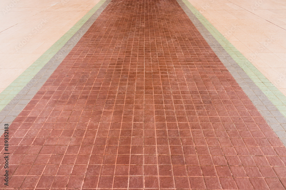 Brown square tile of walkway