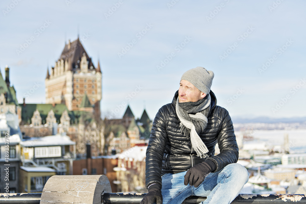 men in front of Chateau Frontenac in Quebec city