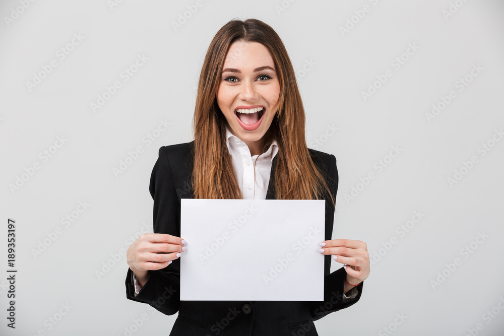Portrait of a happy businesswoman dressed in suit Portrait of a happy businesswoman dressed in suit