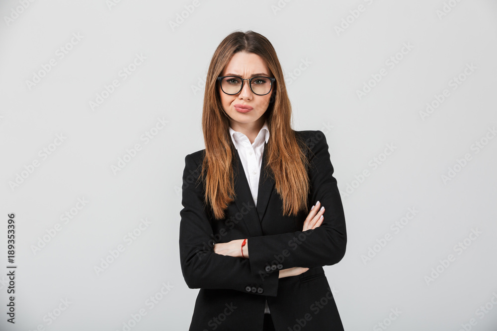 Portrait of an upset businesswoman dressed in suit Portrait of an upset businesswoman dressed in suit