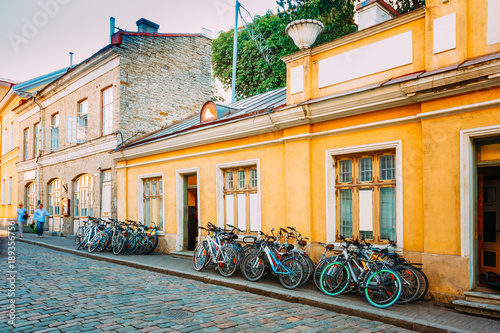 Tallinn, Estonia. Bicycles Rental Bikes Parking Near Old House