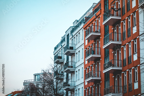 red and white apartments from exterior view in vintage colors