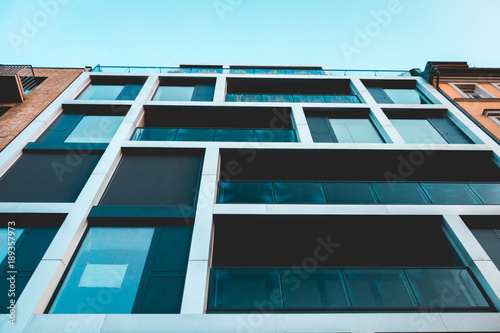dramatic view of futuristic real estate facade