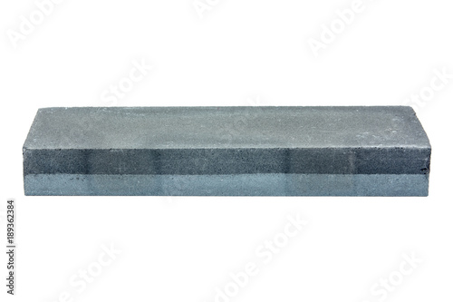 Фотография Whetstone isolated on white.background.Grinding stone isolated