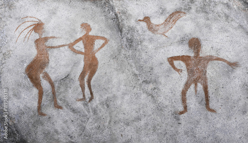 image of ancient people, birds ocher on the wall of the cave. archeology. history.