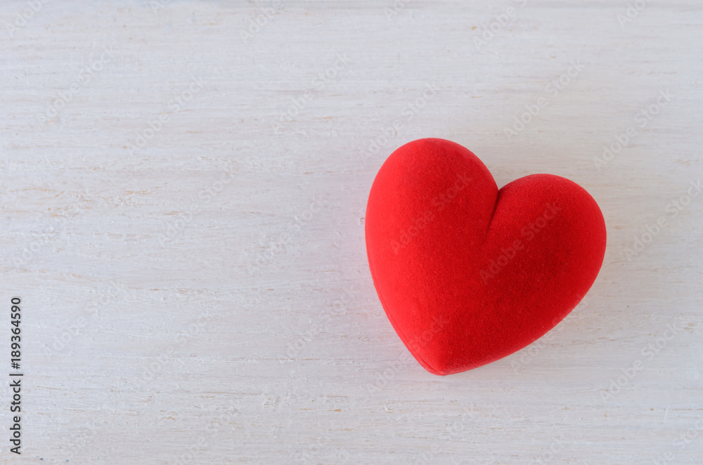 Saint Valentines celebration. Red heart box on white wooden background. Valentines day or Love concept. Copy space Saint Valentines celebration. Red heart box on white wooden background. Valentines day or Love concept. Copy space
