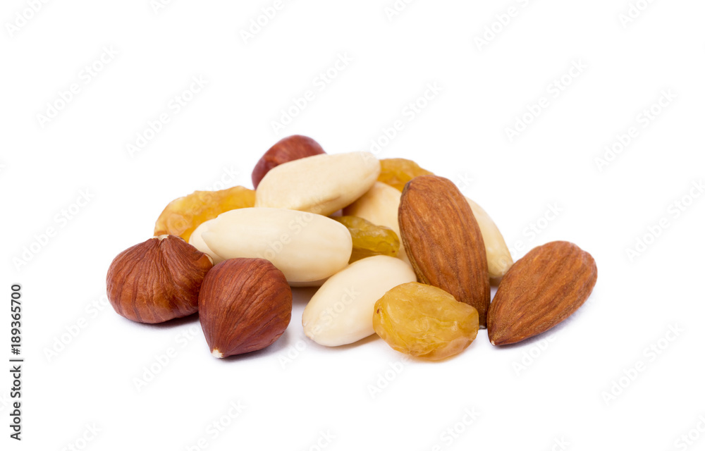 Mixed fresh nuts and raisins isolated on white background Mixed fresh nuts and raisins isolated on white background