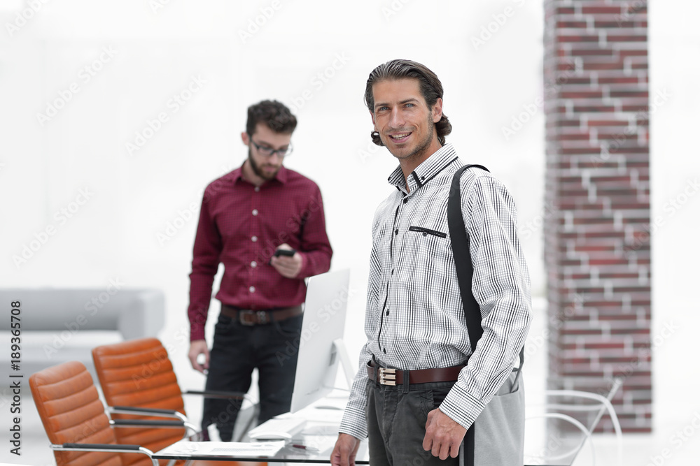 Fototapeta premium employees standing in a modern office