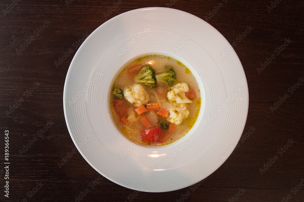 Light soup of fresh vegetables. Healthy food. Low-Carb Diet. Vegetarian food. Light soup of fresh vegetables. Healthy food. Low-Carb Diet. Vegetarian food.