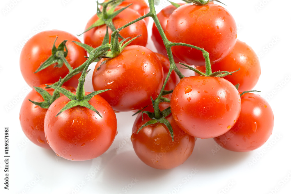 Red tomatoes isolated on white with a clipping path background. Red tomatoes isolated on white with a clipping path background.