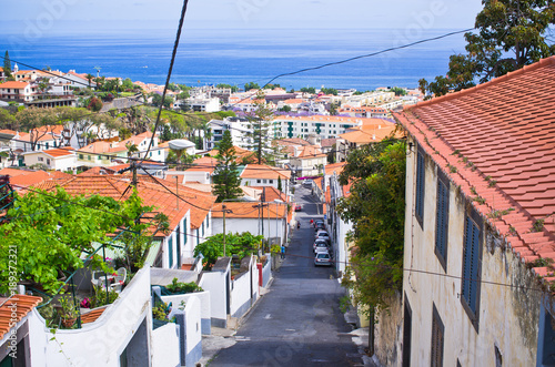 Narrow street of Funchal city, Madeira island