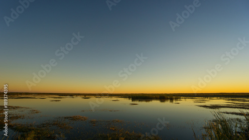 USA  Florida  Orange sky over water after sunset in everglades nature landscape