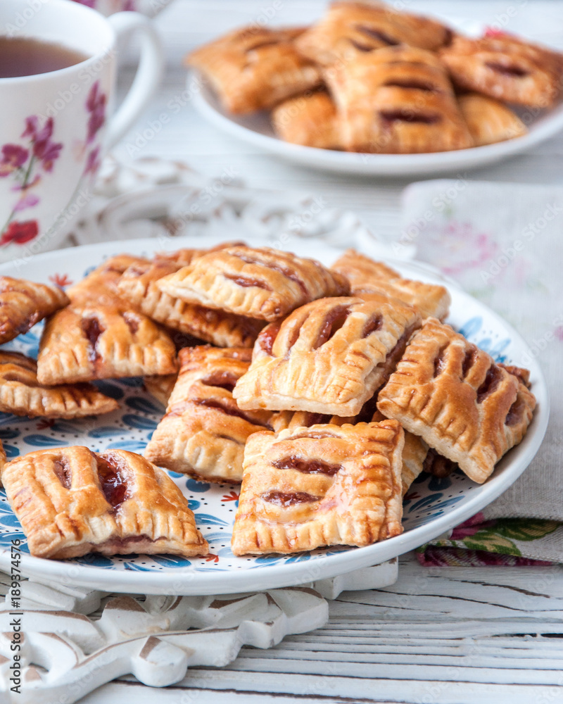 Homemade cookies from puff pastry with strawberry jam Homemade cookies from puff pastry with strawberry jam