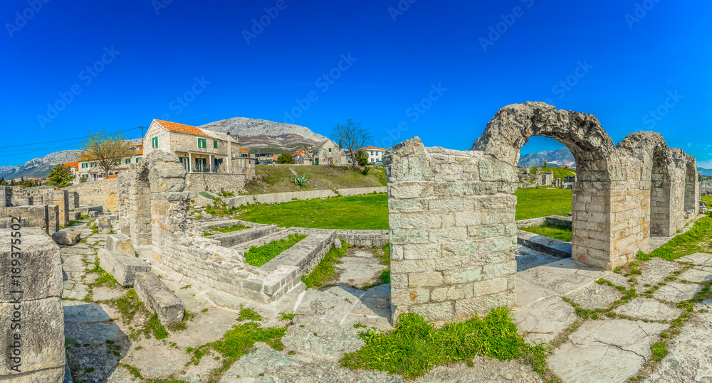 Salona roman ruins panorama. / Panorama of Salona old ruins in suburb of town Split, popular sightseeing historical spot in Dalmatia region, Croatia.