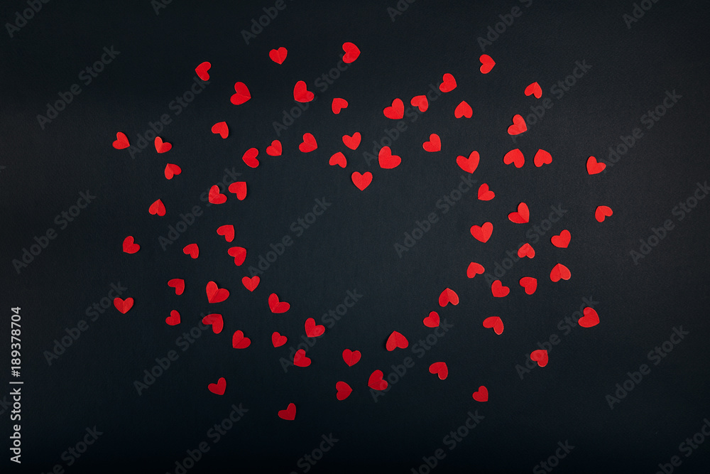 Love red hearts on dark background
