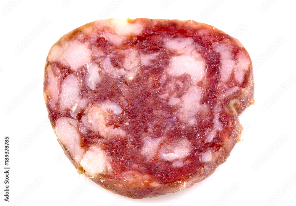 Obraz premium Top view macro detail of smoked salami slices, pepperoni slice, Italian prosciutto crudo ,raw ham texture isolated on white background , with clipping path.