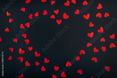 Love red hearts on dark background 